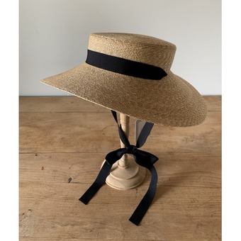 mature ha. braid straw hat middle